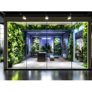 Contemporary modular building interior featuring living green wall system integrated with vinyl-faced walls and Document M compliant contrasts