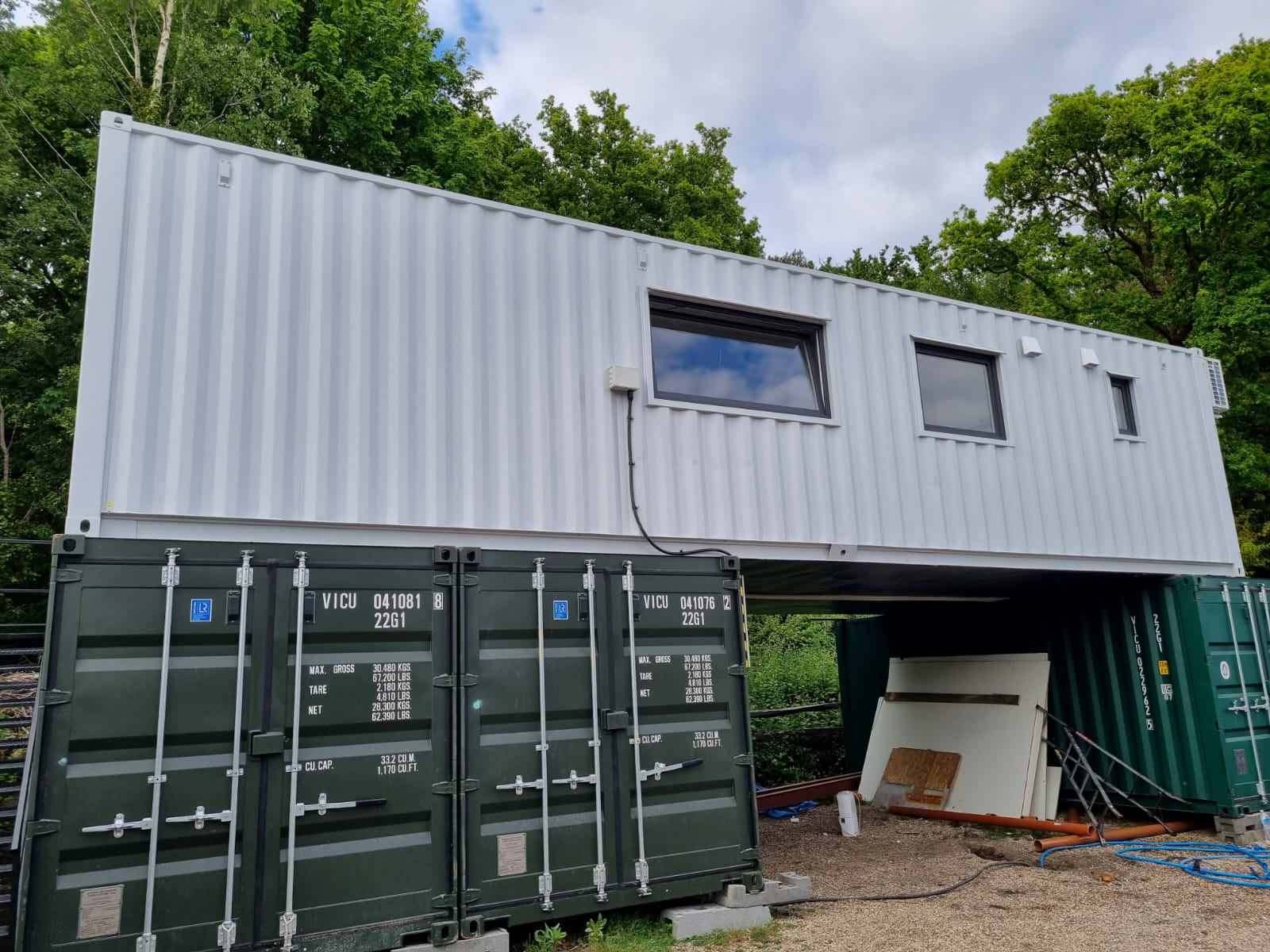 Multi-unit container conversion classroom block with industrial steel finish for vocational training