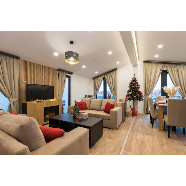 Modern insulated modular lodge in a UK countryside setting, suitable for year-round modular living, holiday accommodation or private leisure use.