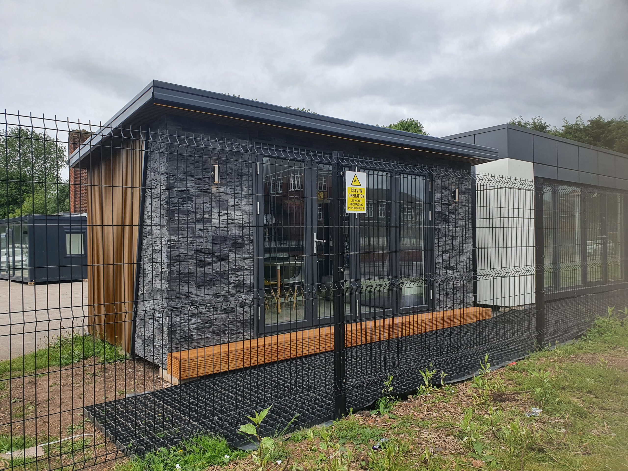 Modular garden room exterior example with full-height glazing and modern cladding, manufactured by KC Modular Buildings
