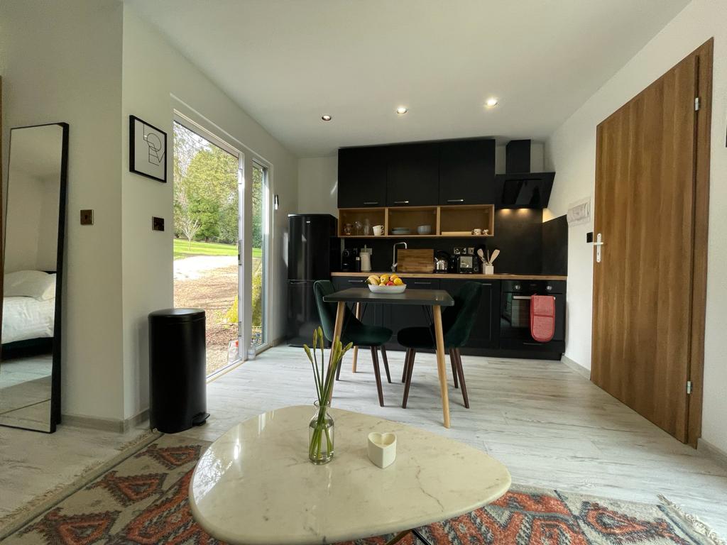 Compact ISO frame modular office with light grey cladding - single module temporary site office for construction and commercial use