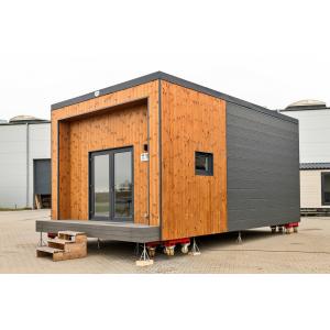 Contemporary modular building with dual-material exterior and modern glazing