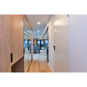 Texel Deluxe Mobile Home entrance hallway featuring premium wood flooring and mirrored storage