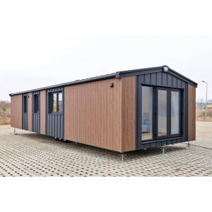 Texel Deluxe Mobile Home exterior featuring premium FS-202 wood cladding and anthracite trim details