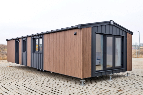 Texel Deluxe Mobile Home exterior featuring premium FS-202 wood cladding and anthracite trim details