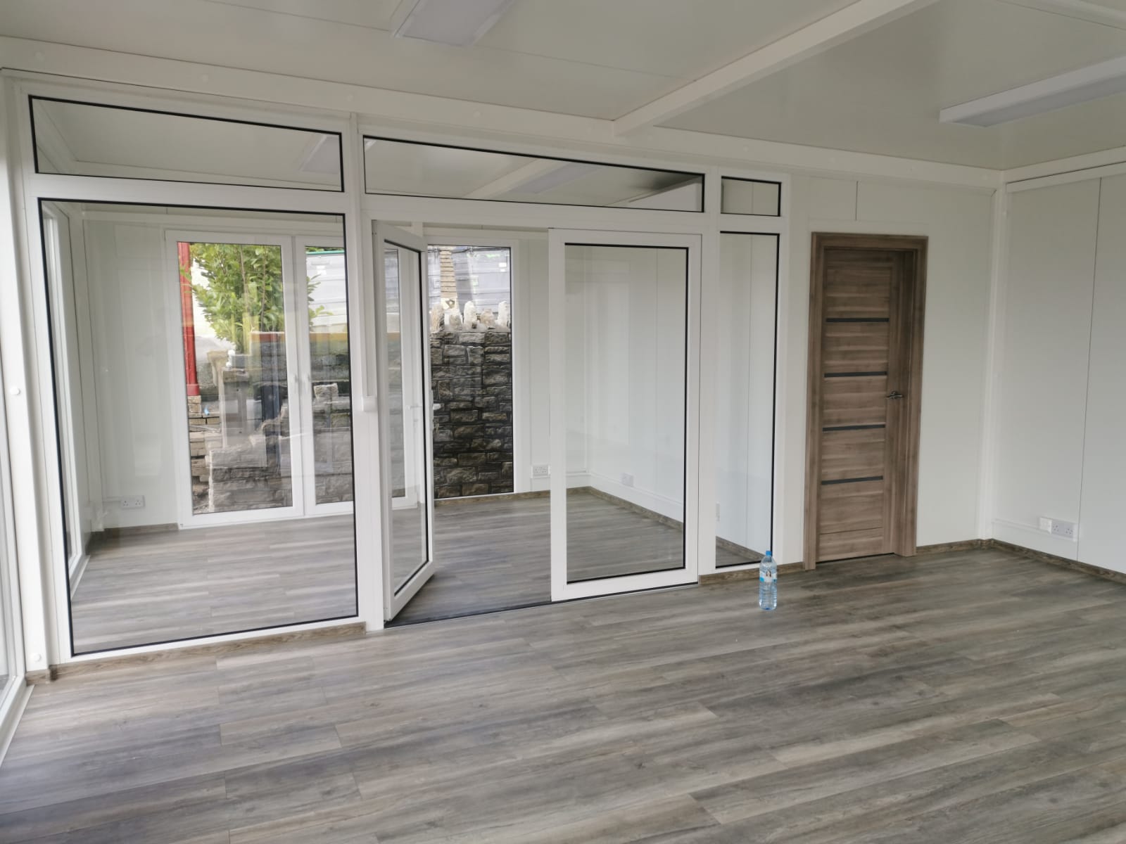 Curry modular building partitioned interior showing separate office rooms with internal walls, doors, and professional finishes for multi-room commercial use by KC Modular Buildings