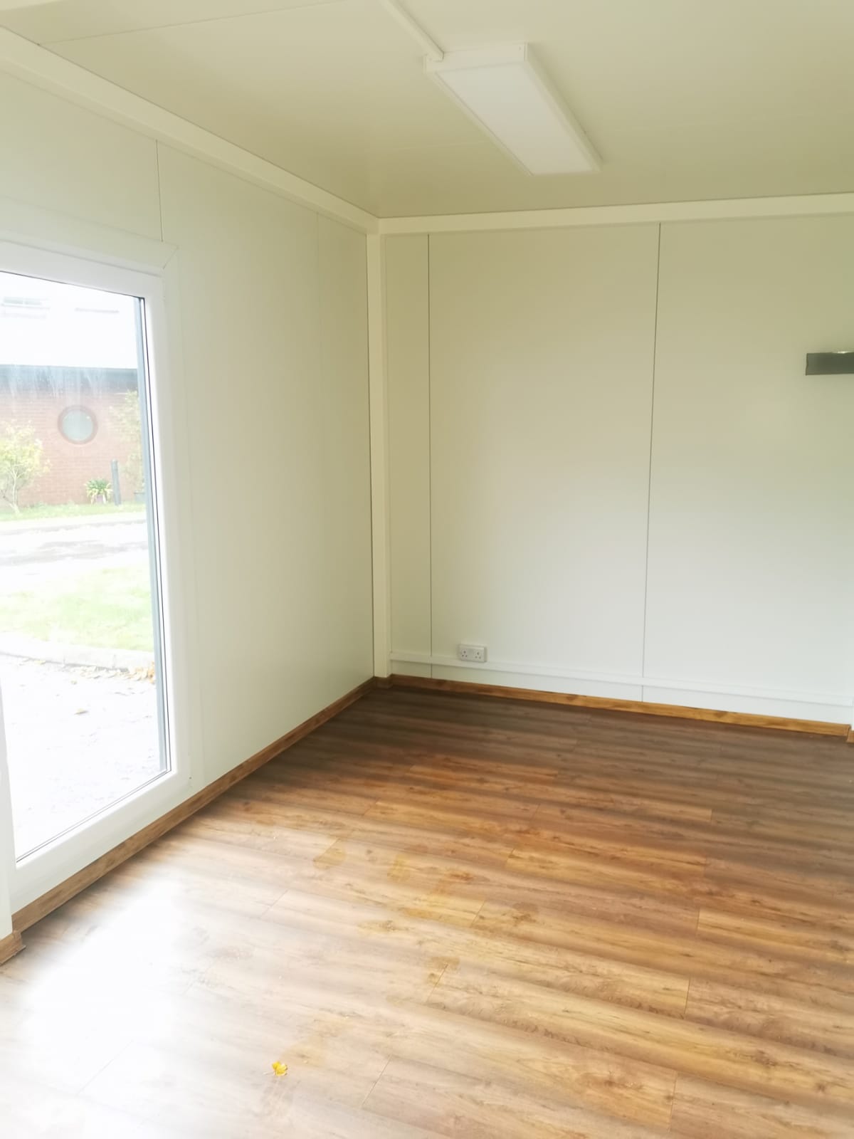 CE-O Option 2 cost effective modular building with partitioned office and additional room showing steel frame construction, internal walls, separate spaces for multi-functional affordable use