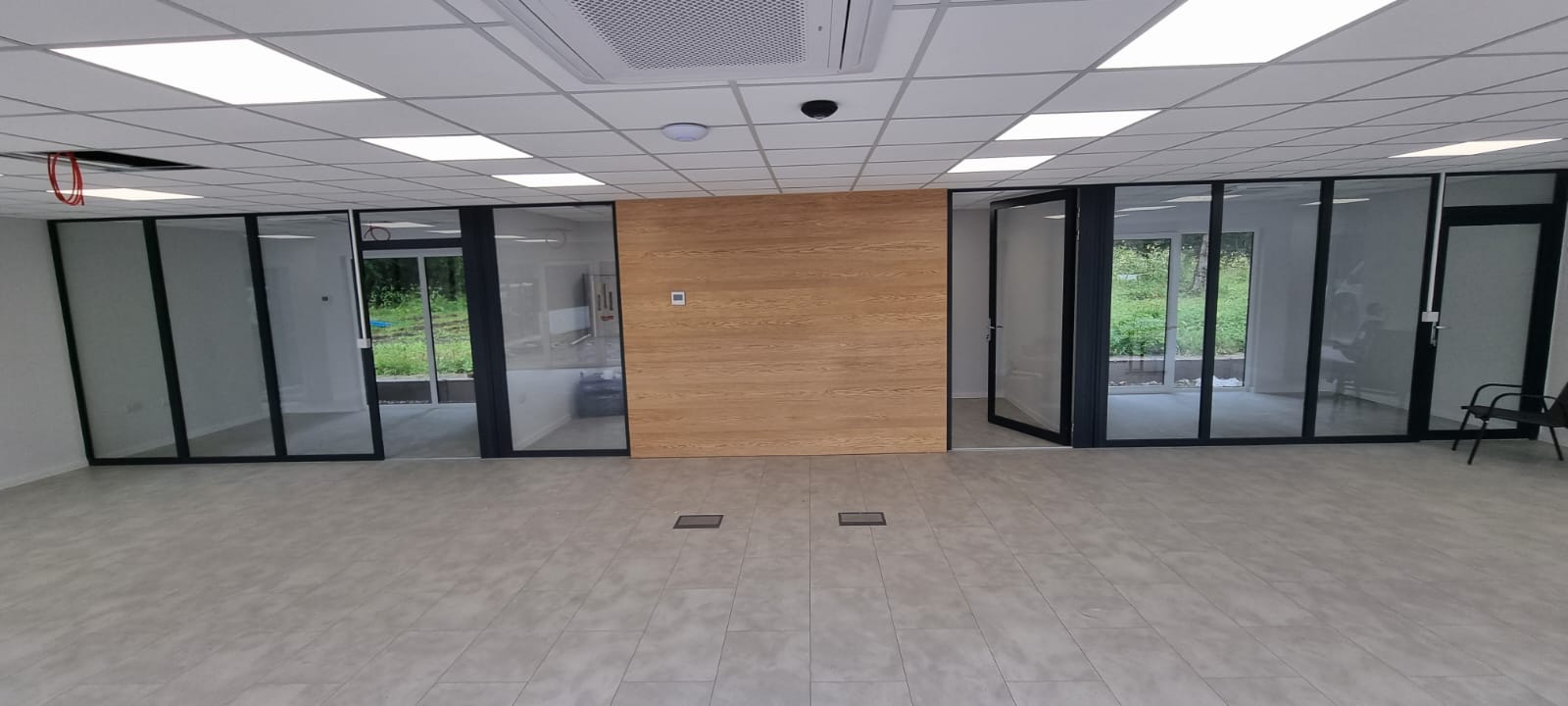 Curry bespoke modular building construction site installation showing steel-frame precision-engineered angles and KINGSPAN panel assembly by KC Modular Buildings UK