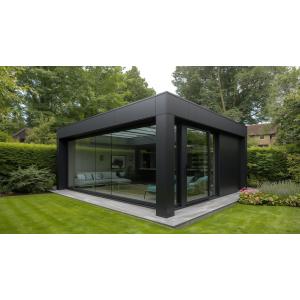 Bold black garden room with dramatic modern architecture and large glazing in a UK residential garden