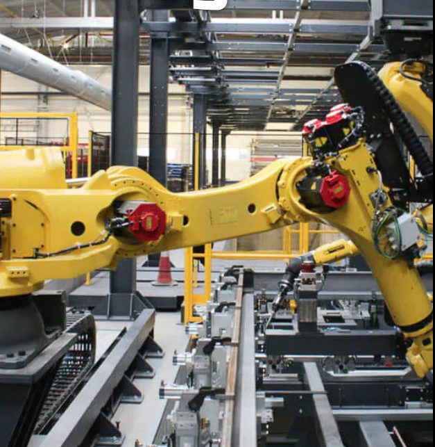 Modular building production line in UK manufacturing facility showing quality control and assembly process