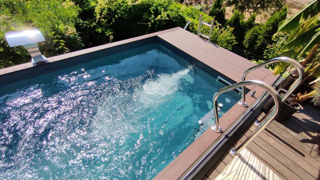 Prefabricated swimming pools UK – modular infinity pool design with terrace setting (render)