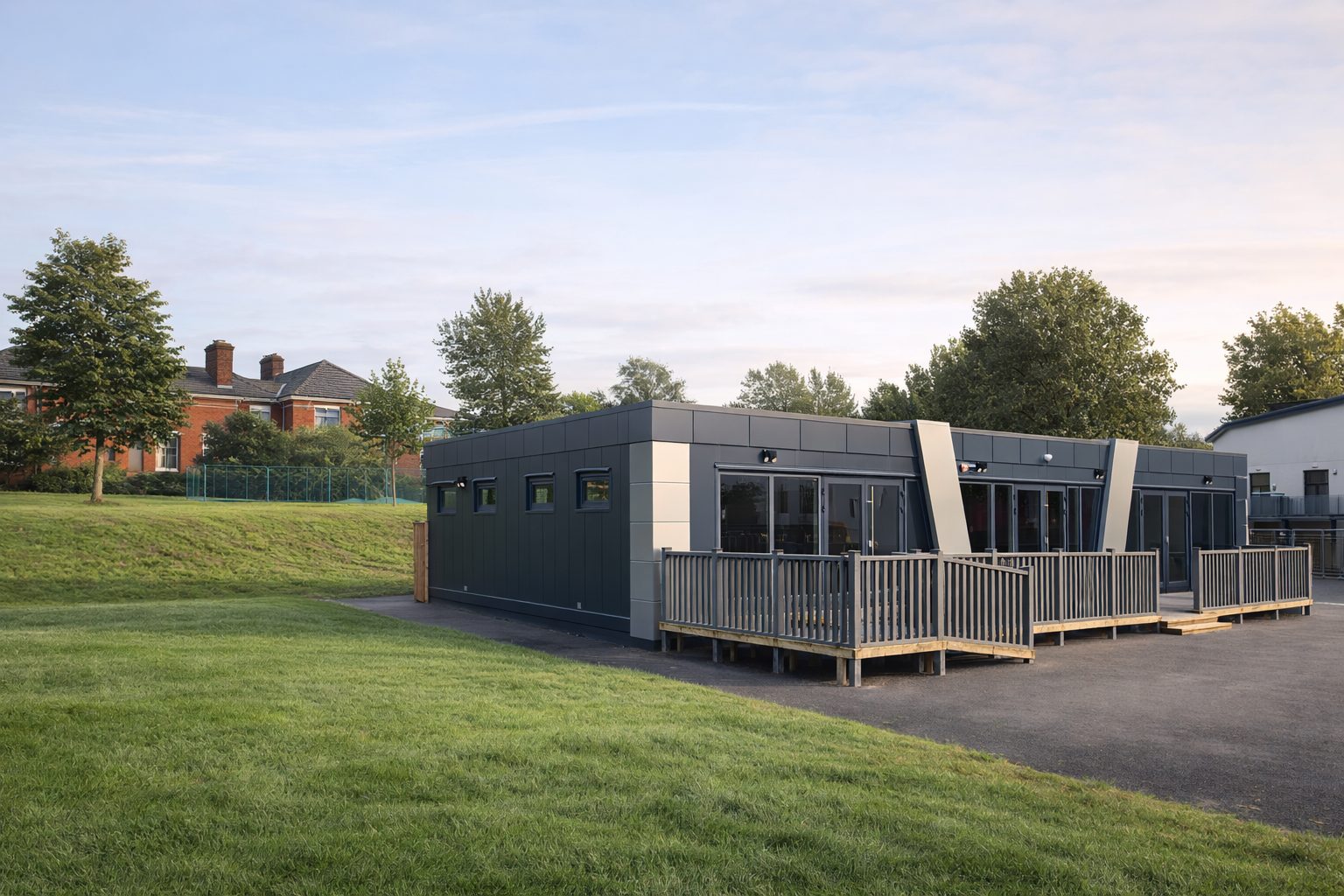 Modern modular classroom building at British school with large windows and accessible entrance