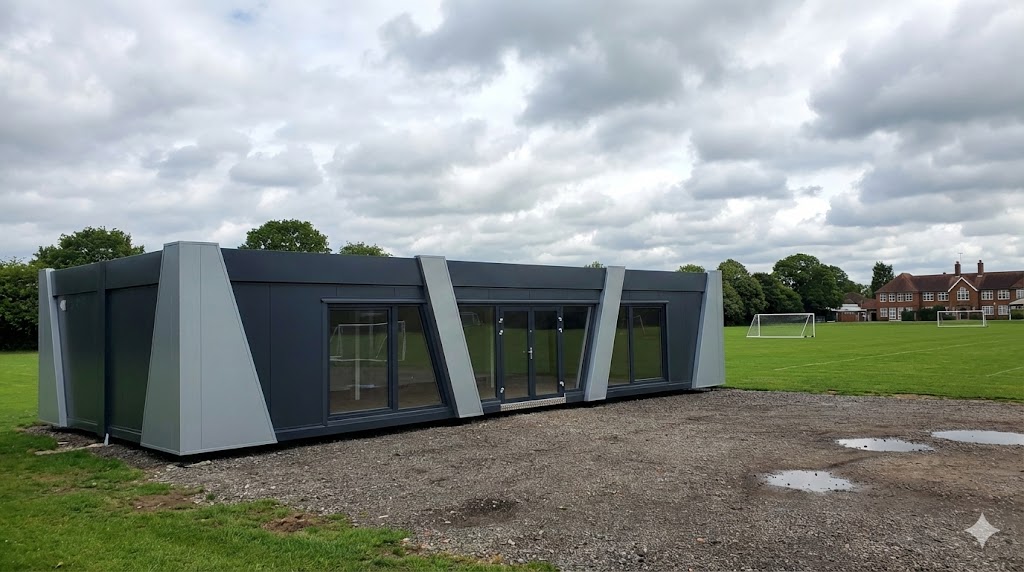 Modular building installation in progress - KC Modular Buildings UK project showing factory-built unit being positioned on site with crane