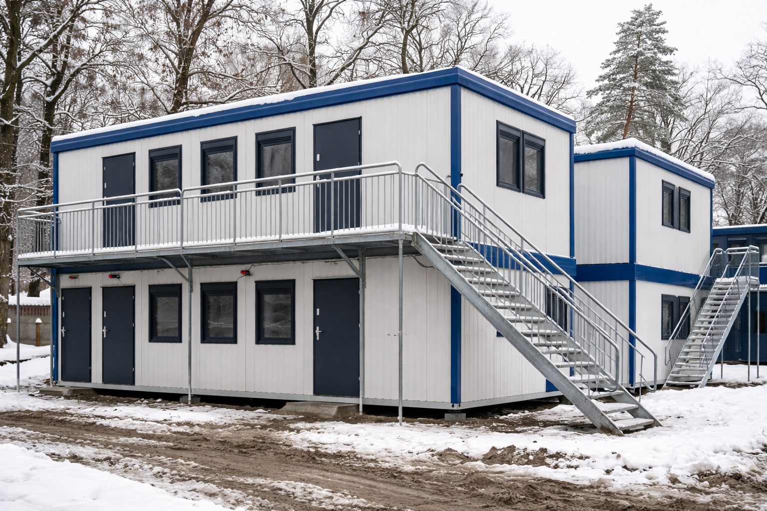 ISO frame modular units UK — two-storey stacked portable cabin offices on construction site