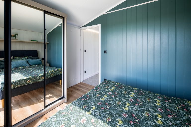 Bespoke lodge bedroom with furnished interior for holiday homes and rental accommodation