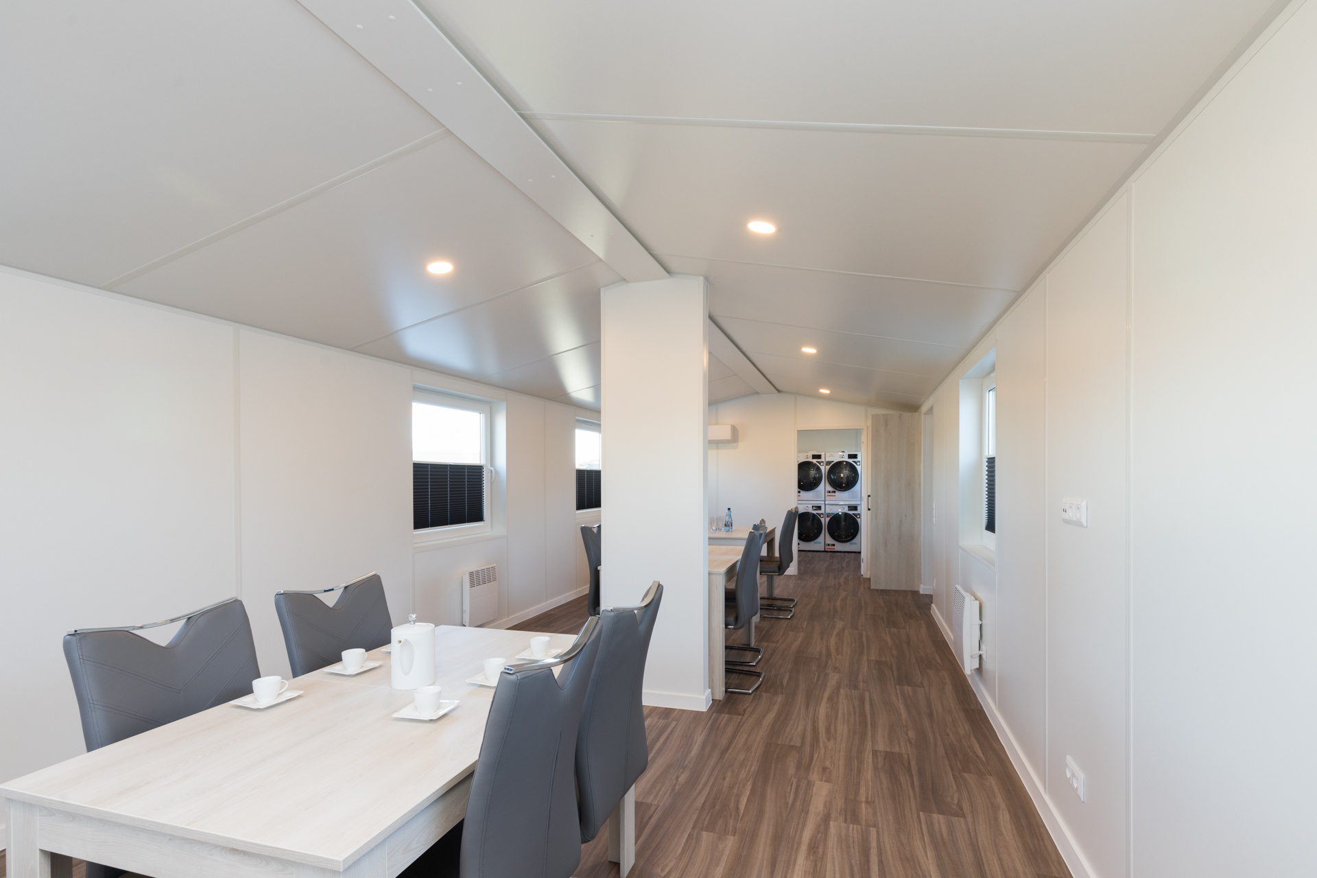 Durable wood effect flooring inside a modular holiday park washroom cabin