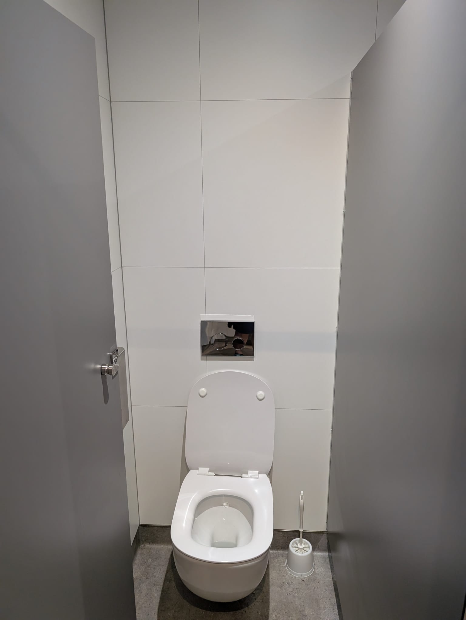 Private WC compartment within the modular welfare unit with modern wall panels and easy-clean flooring.