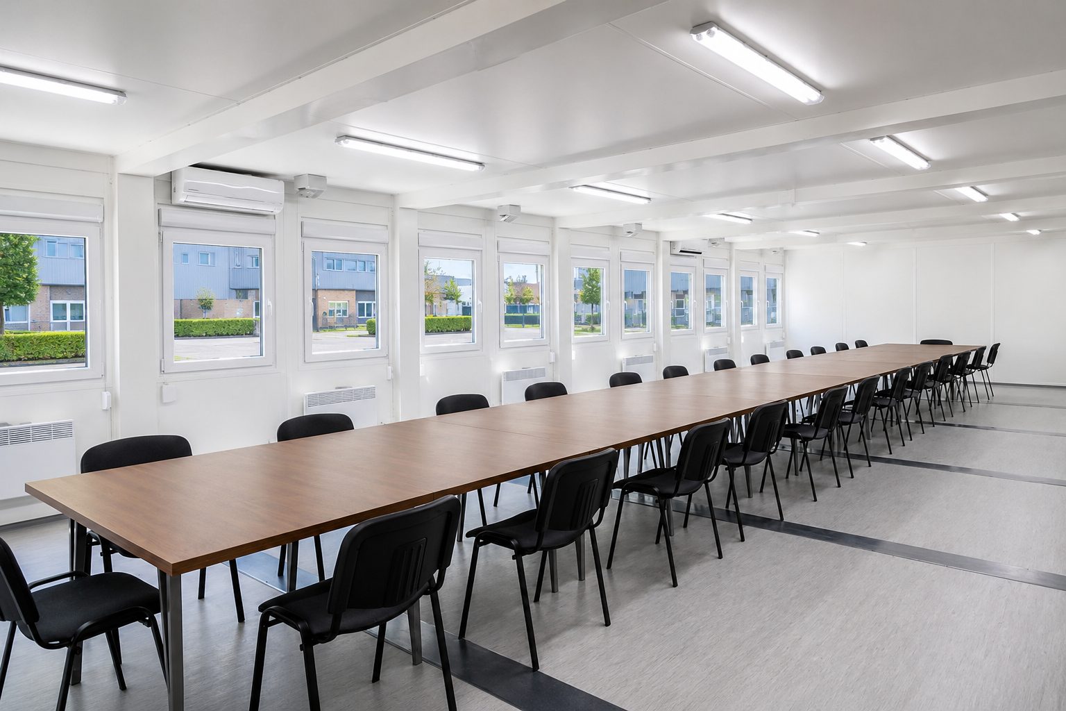 Modular meeting room internal layout with long meeting table by KC Cabins Solutions
